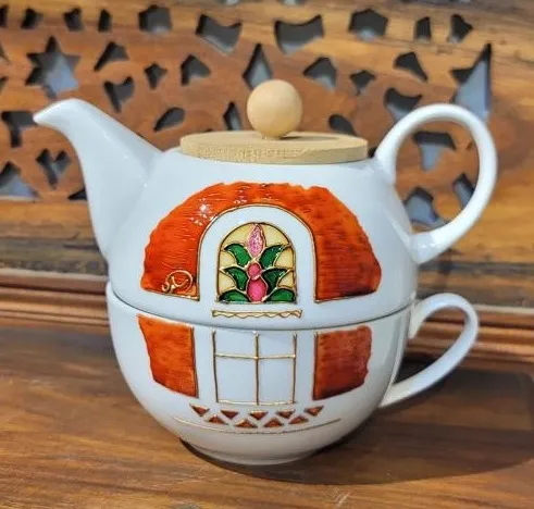 Ceramic Teapot with Decorated Cup